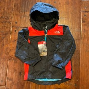 New rain jacket with tags